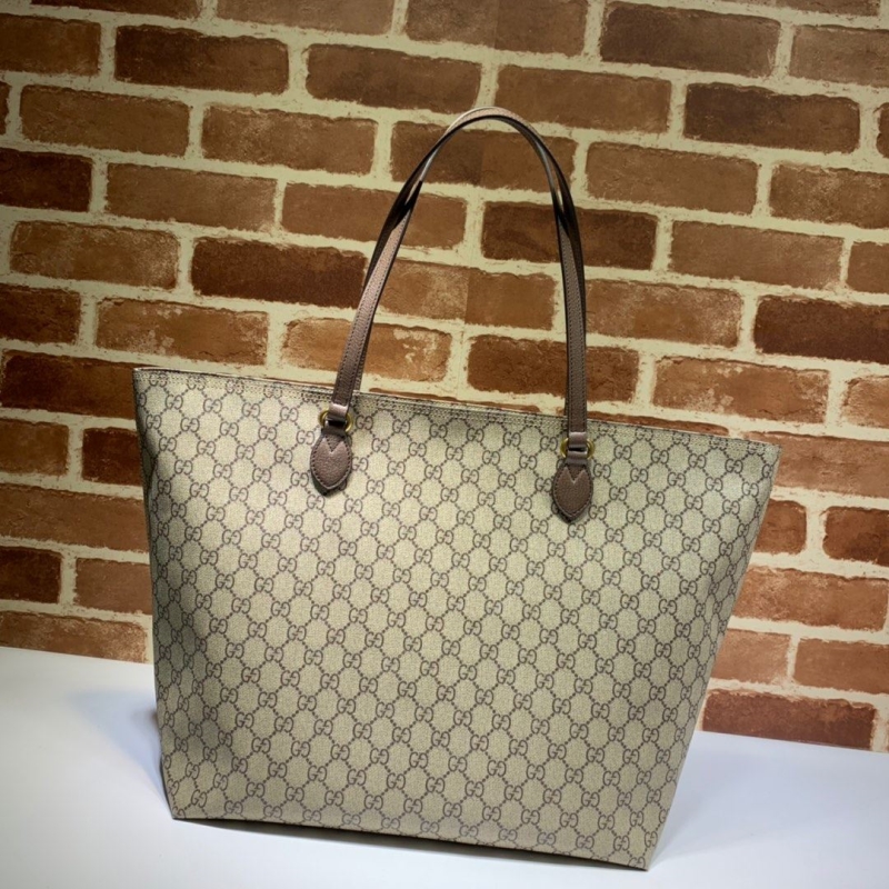 G*u*i shopping bags